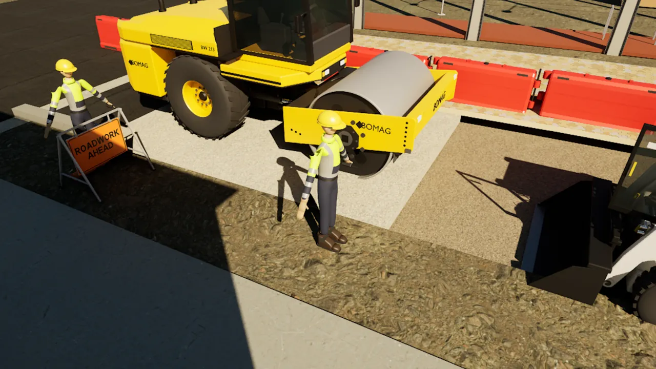 Kerb and base: Base compaction beside the new kerb, with traffic control.